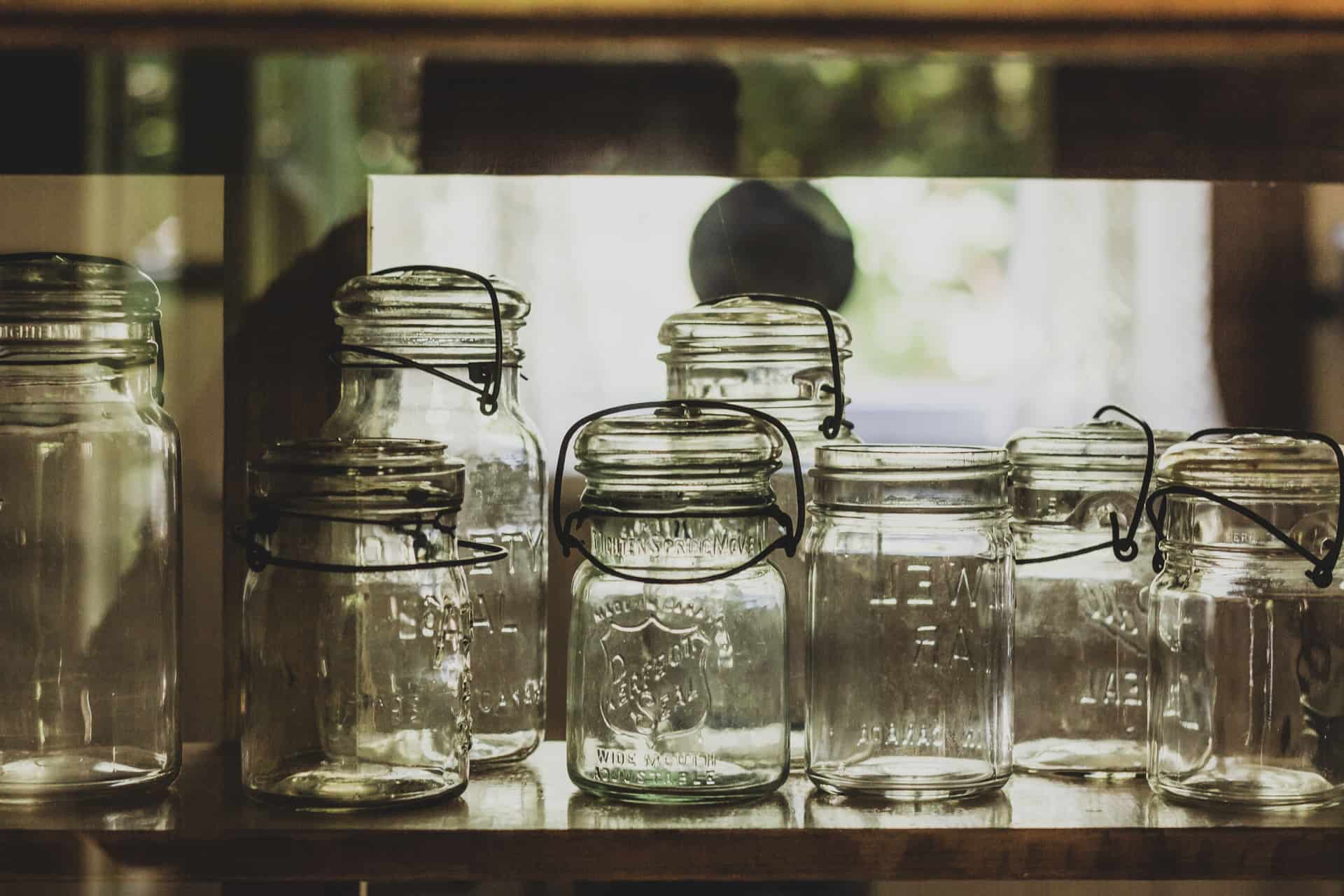 Close-up of empty glass mason jars