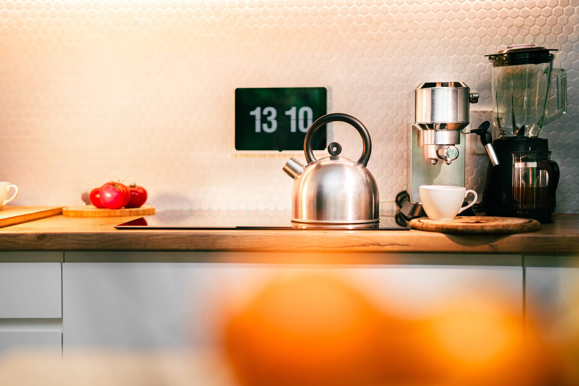 A kitchen counter with small countertop appliances