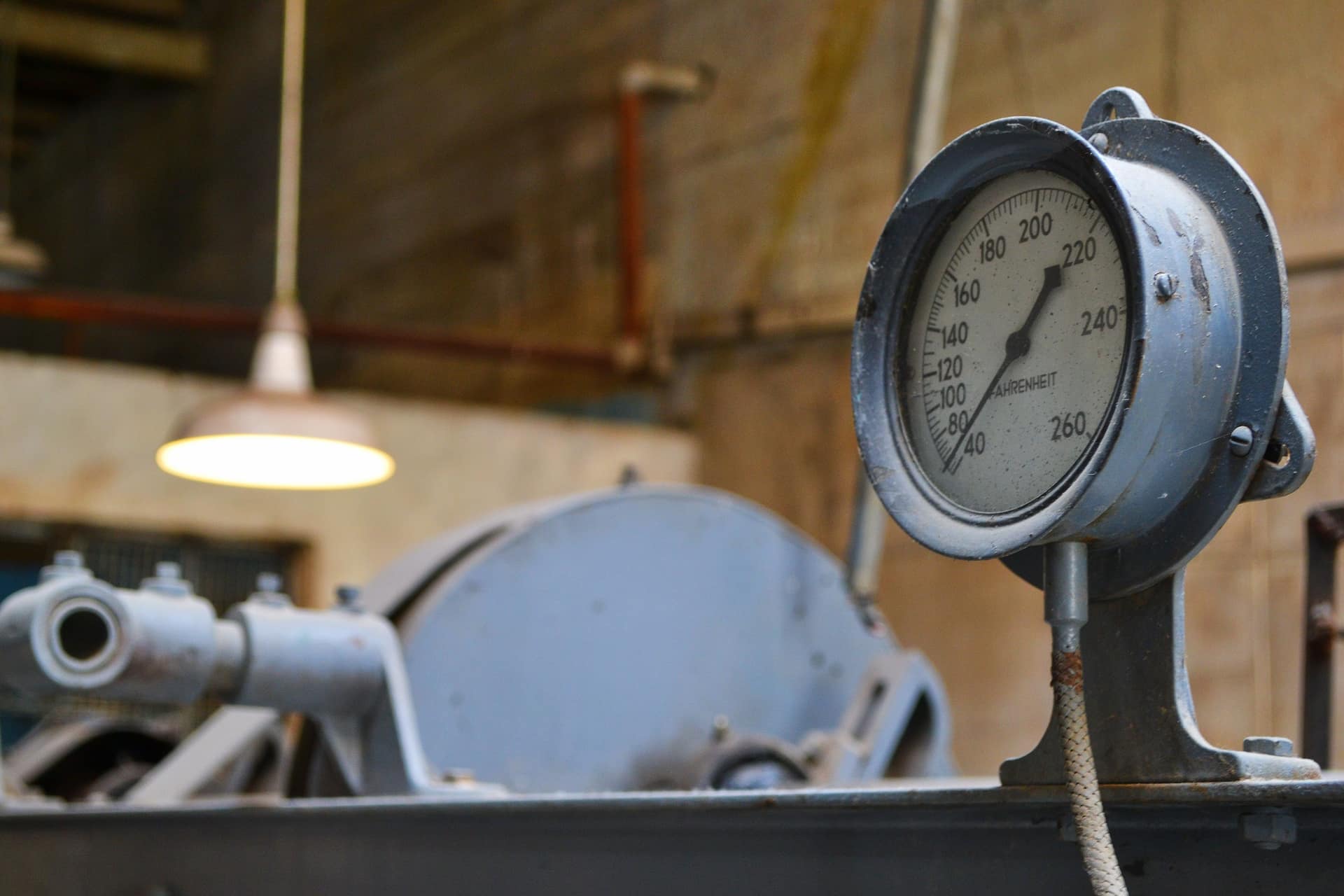 Close-up of a metal pressure gauge dial