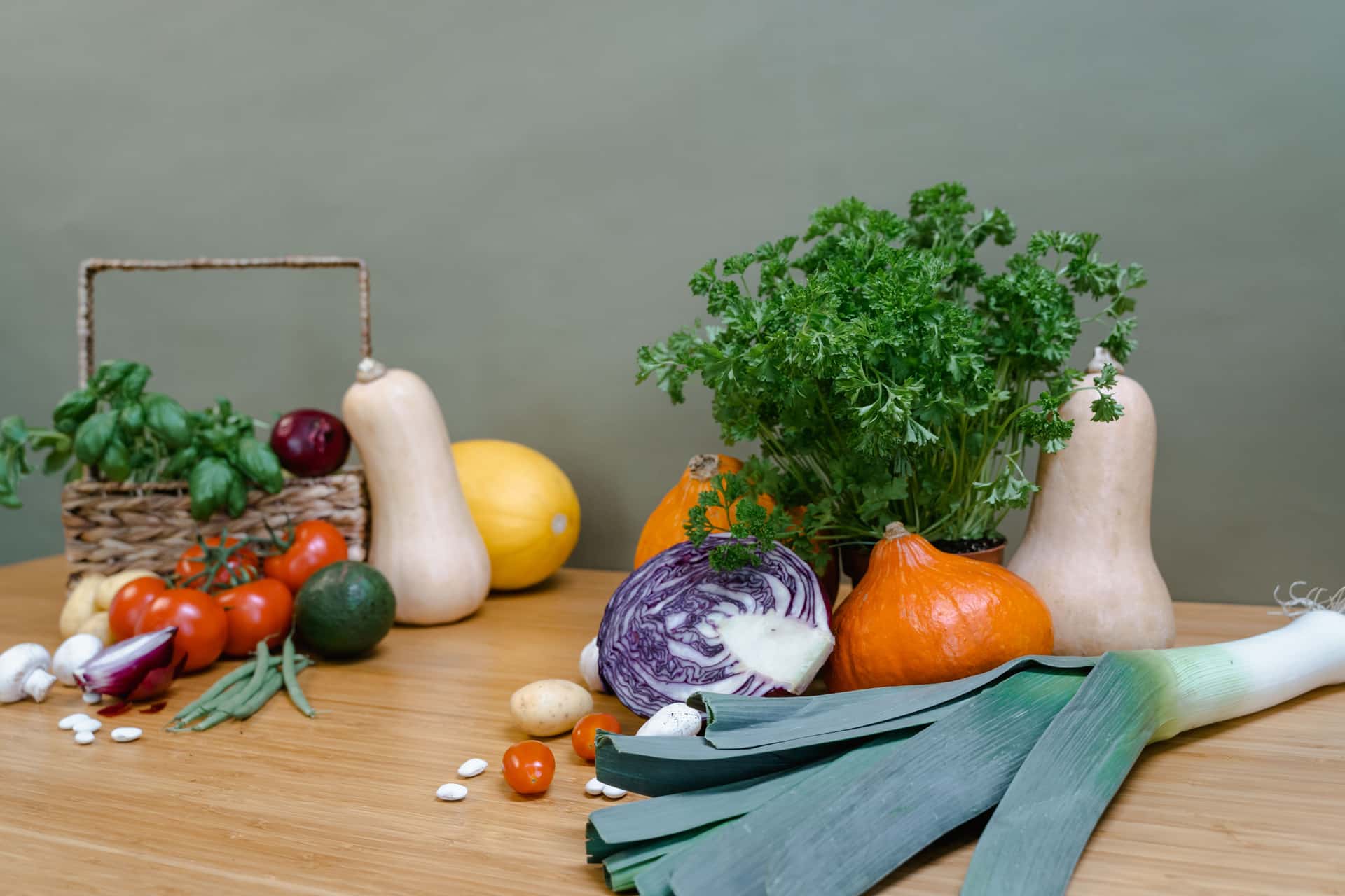 Fresh vegetables on a wooden kitchen table