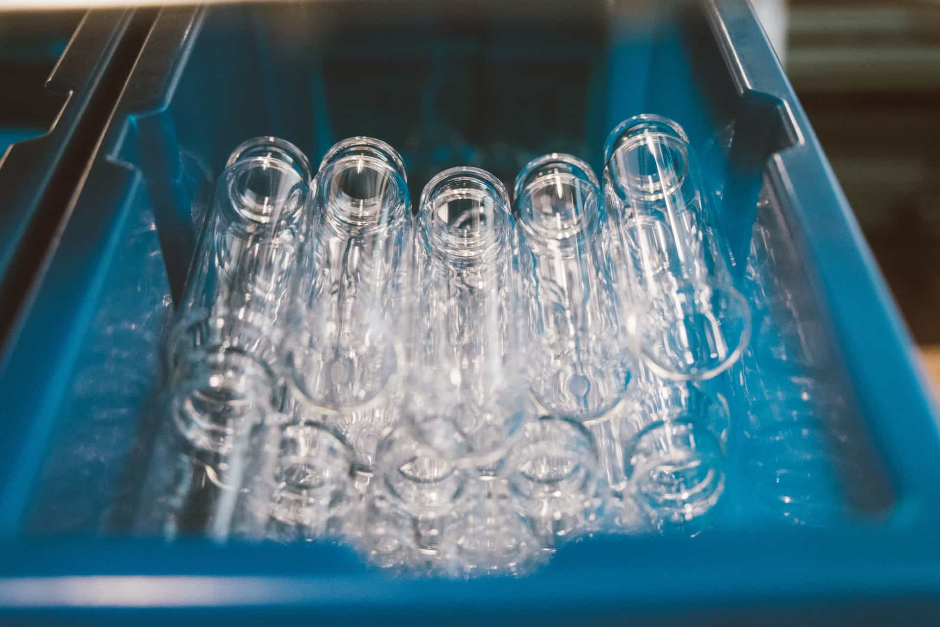 Clean glass containers stacked in a rack