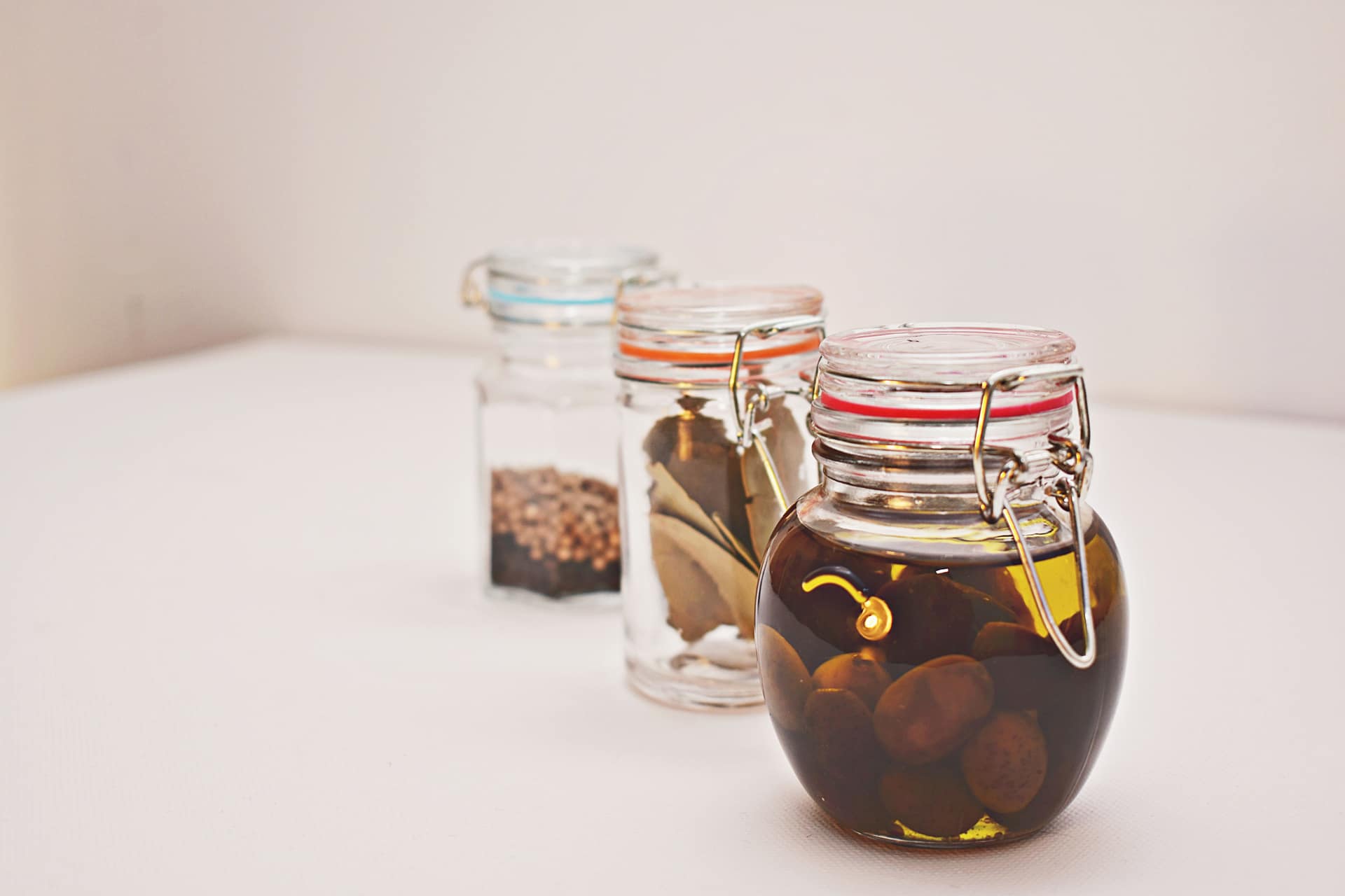 Preserved and pickled food in assorted glass jars