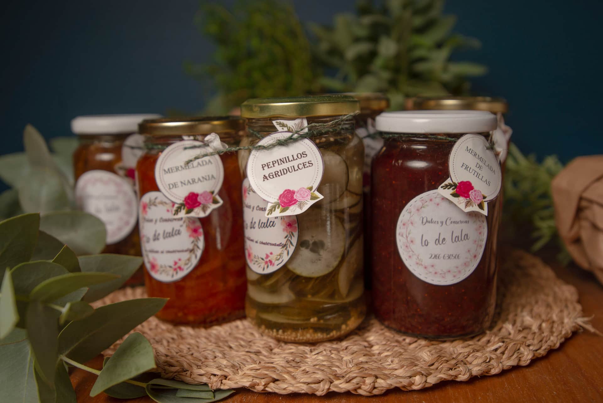 Assorted homemade jams and pickles in glass jars